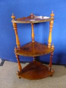 A Victorian walnut what not having three tiers, est. 40 x 28 x 86 cms.