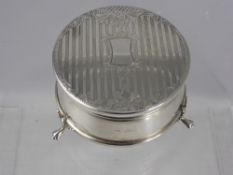 A Solid Silver Ring Box, engine turned with floral engraving to top, with blue velvet lined