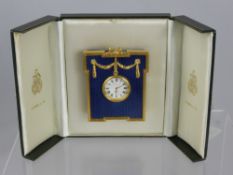 A Kitney & Co Small Silver Desk Clock, Guilloche blue enamel finish, in the original presentation