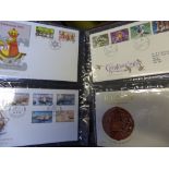 Seven albums of GB first day covers.