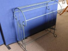 A contemporary wrought iron towel rail, est. 80 x 40 x 82 cms.