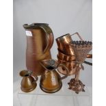 A collection of vintage pewter including five graduated tankards and a small jug together with a