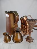 A collection of vintage pewter including five graduated tankards and a small jug together with a