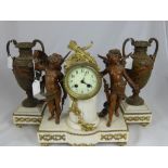 A Circa 19th Century French Clock Garniture, the white marble centre piece having two painted winged