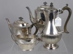 A Silver Plated Tea and Coffee Set by Mappin & Webb & Co., coffee pot (WAF), tea pot, sugar bowl and