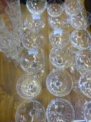 Eighteen assorted champagne glasses together with a set of six champagne flutes (24)