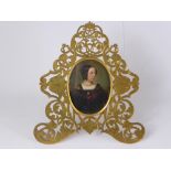 An Oval Portrait Miniature Oil of a Lady, the portrait depicting a distinguished lady, presented