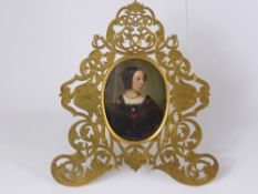 An Oval Portrait Miniature Oil of a Lady, the portrait depicting a distinguished lady, presented