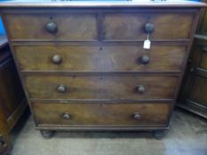 A Victorian Mahogany Chest of Drawers, having two short and three graduated long drawers,