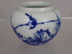 Chinese Blue and White Pot, depicting a bird resting, character marks to base, 7 cms h.