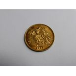 A George V 1911 half sovereign (good condition)