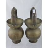 Two Indian Brass Water Vessels, hand engraved with various gods, est, height 40 cms. including the