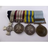 A Group of Four Medals, including DSC., Malaya, Korea, (x 2), the 925 hallmarked cross engraved Lt
