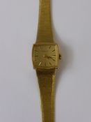 A Lady's 9ct Gold Eterna Wrist Watch, the watch having a 9ct gold bark finished bracelet, approx