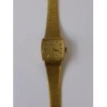 A Lady's 9ct Gold Eterna Wrist Watch, the watch having a 9ct gold bark finished bracelet, approx