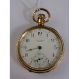 A Waltham 10 ct Gold Plate Pocket Watch. The watch having a white enamel face with minute dial.