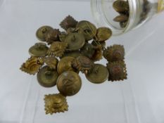 A collection of South Staffordshire Regimental Buttons, dated 1939, contained in a glass jar.