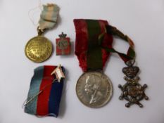 A Collection of Various Italian Badges, including a Merit Badge with the original ribbon, a
