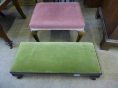 Two footstools, one covered in a pink fabric, the other in green (2)