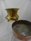 A Brass Plant Pot with lion mask claw feet together with a silver plate cruet set and a copper fruit