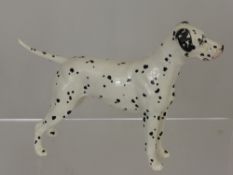 A Beswick Porcelain Figure of a Dalmation, Arnoldene, 21 x 14 cms, stamped Beswick England.