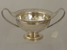 A Solid Silver Twin-Handled Pedestal Bowl, the bowl with pierced gallery and beaded border,