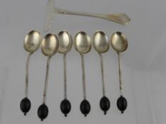 Solid Silver Coffee Spoons, with bean finial's together with a silver porridge pusher.