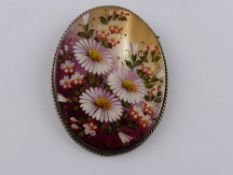 A Lady's Hand Painted Russian Brooch, depicting Michaelmas daisy's, signed Kohobo.