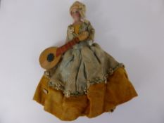 A Miniature Simon & Halbig Bisque Shoulder-headed doll, with her original wig wearing regional