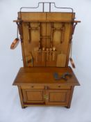 A German Miniature Vintage Pine Dresser, the dresser having metal bound edges with stepped shelves