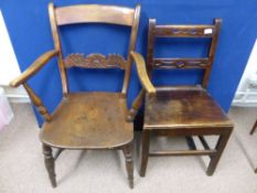 Two vintage mahogany kitchen chairs, one being a bar back armchair with decoration to the lower bar,