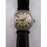 A Gentleman's Ocle Wrist Watch, on a dark brown leather strap.