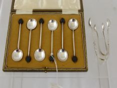 A Set of Six Silver and Bean Coffee Spoons, dated 1925/26 m.m CB&S together with a  pair of silver