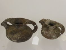 Two 1st Century Roman Terracotta Oil Vessels, with beaded decoration to both spout and handle, faint