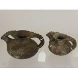 Two 1st Century Roman Terracotta Oil Vessels, with beaded decoration to both spout and handle, faint