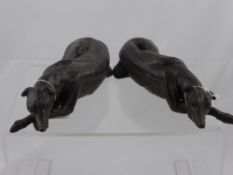 Two Bronze Companion Figurines, depicting resting lurchers, approx 23 cms