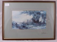 A David Shepherd print depicting a Lion under aTree, framed and glazed approx 29 x 16 cms.