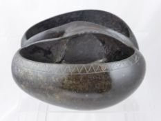 A 19th Century Coco De Mer Nut, (Lodoicea Maldivica) worked as a basket, the nut carved out to leave