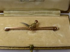 A Lady's 9 ct Yellow Gold, Platinum and Enamel Pheasant Bar Brooch 3.3 gms wt.