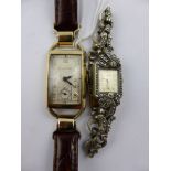 A Lady's Bulova Wrist Watch, 10k Gold Filled, nr 1142822 on a brown leather strap together with a