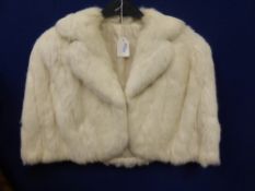 A Vintage White Rabbit Cape Jacket together with a Mink Style Fur Cape.