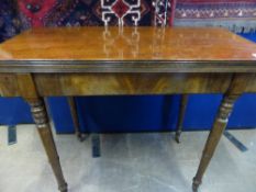 A Victorian mahogany open leaf tea table, the top having reeded decoration to the edge on turned