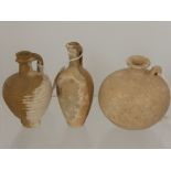 Three Roman 1st/2nd Century A.D Rough Finish Terracotta Vessels, all three approx 14 cms high.