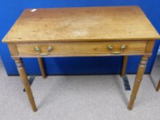 An Edwardian mahogany hall table having a dummy drawer to the front on turned legs, approx 86 x 46 x