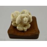 A Japanese Ivory Carved Netsuke depicting the three monkeys.  The carved figure having character