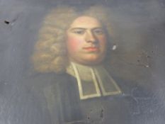 An early 18th century oil on canvas in the style of Godfrey Kneller depicting a gentleman, est. 62 x