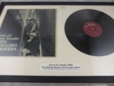 A framed and glazed Rolling Stones album "Out of Our Heads" by Decca records 1965 together with a