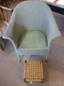 A Lloyd loom cane chair made by W Lusty and Sons Ltd in Bromley by Bow London, together with a