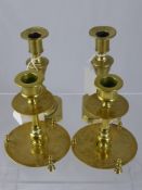 Two Small Pairs of Brass Candlesticks and one brass table lamp stand with 'knot' design.