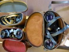 A Pair of Carl Zeiss 8 x 30 B Binoculars in leather case, a pair of Dr Wohler Saar Octamar 18 x 30